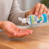 Gel hydroalcoolique 100 mL utilisé par friction pour désinfecter les mains, format compact avec bouchon clapet pratique pour une utilisation quotidienne
