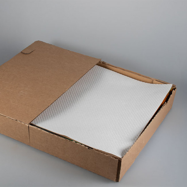 Set de table en papier blanc vendu en boîte distributrice